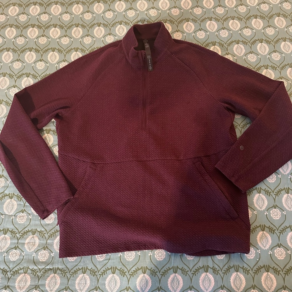 Lululemon At Ease Half Zip, in good condition and size large.